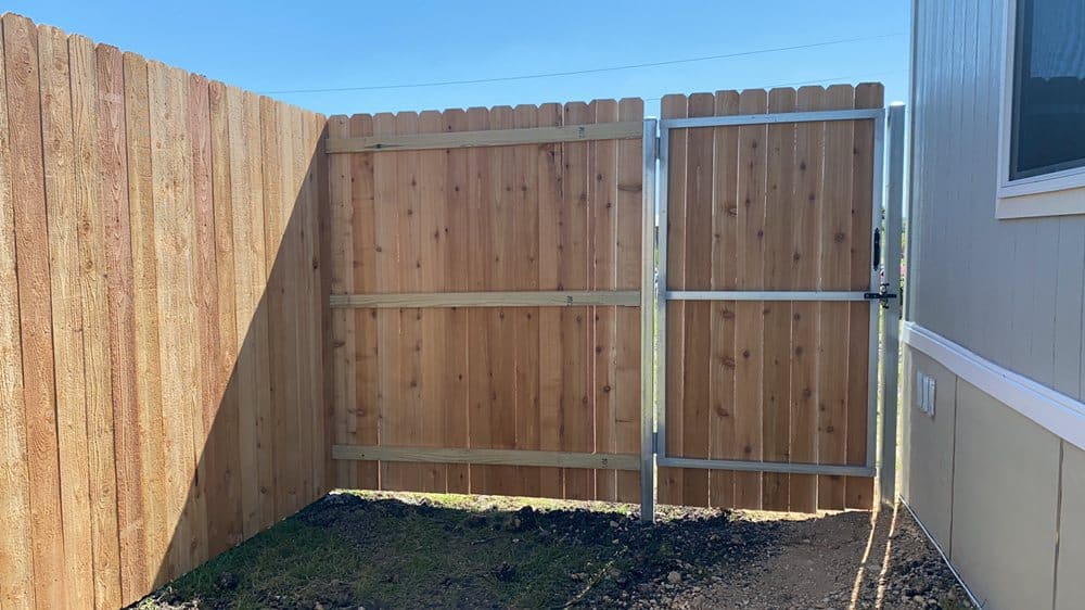 Wood Privacy Fence Built in the Backyard of a House